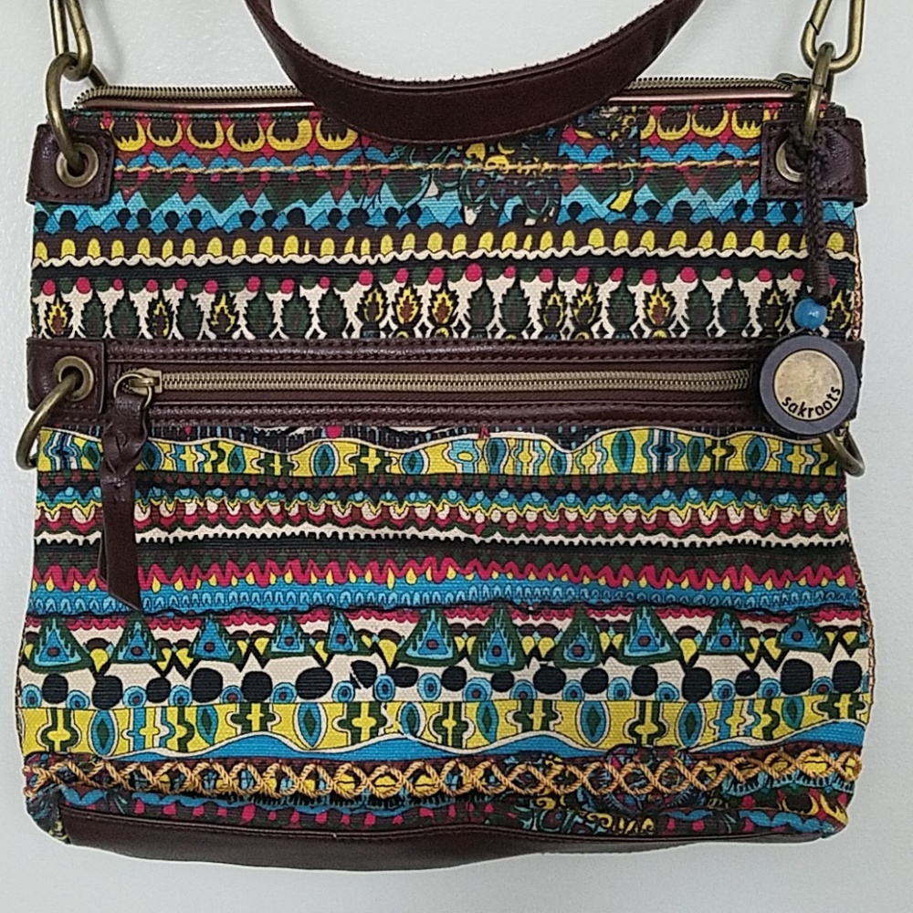 Adjustable crossbody sakroots bag